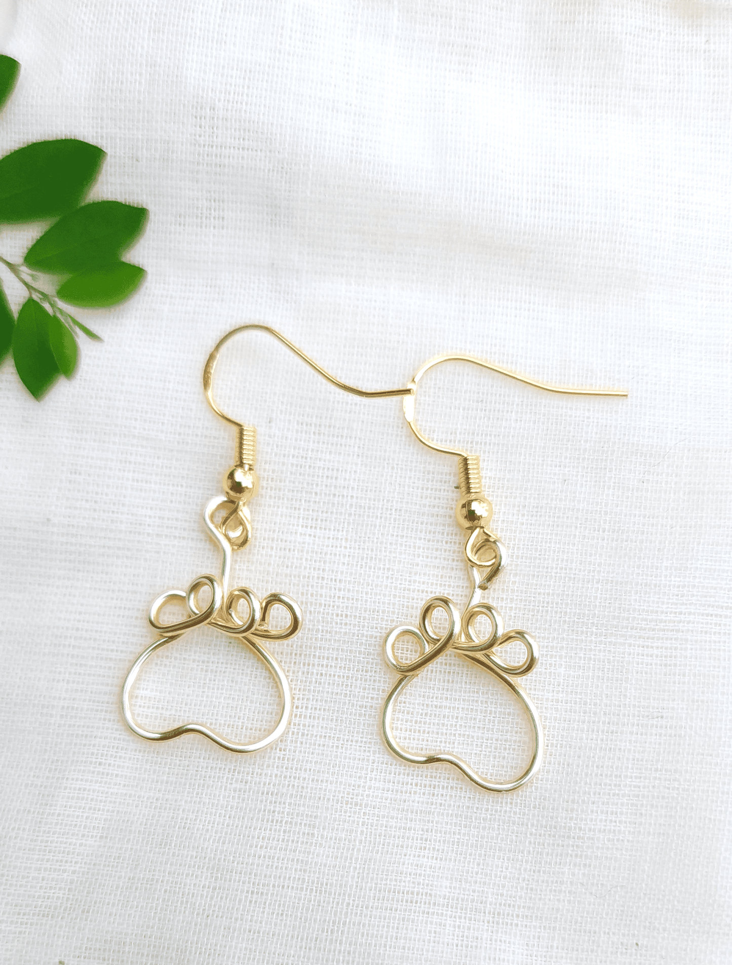 Minimalist Gold Or Silver Paw Print Hypoallergenic Earrings