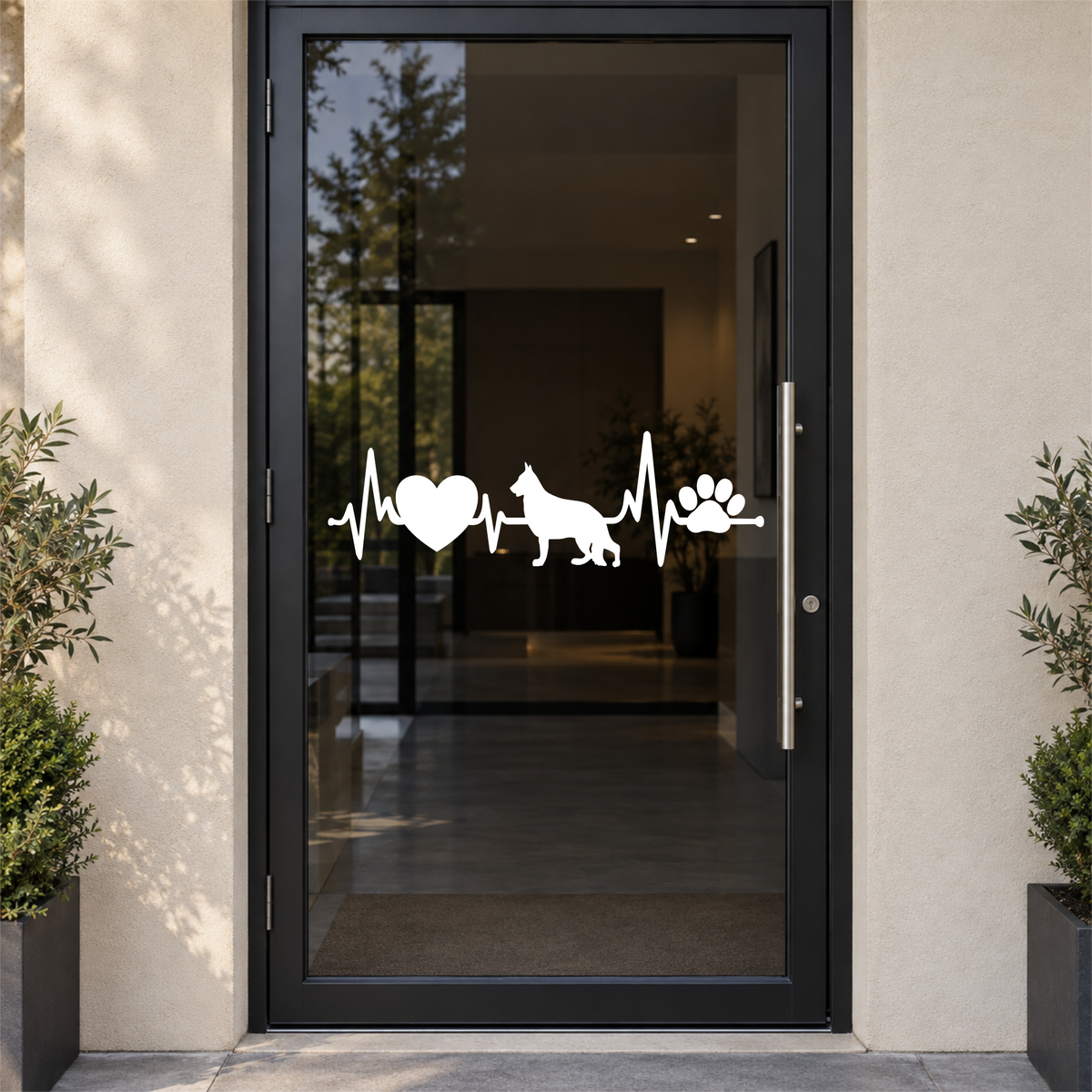 White dog heartbeat cut vinyl decal shown on a smoky glass door